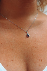 Amethyst crystal necklace on model